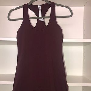 Lululemon Never worn Tank top, in pretty red wine color size 4.